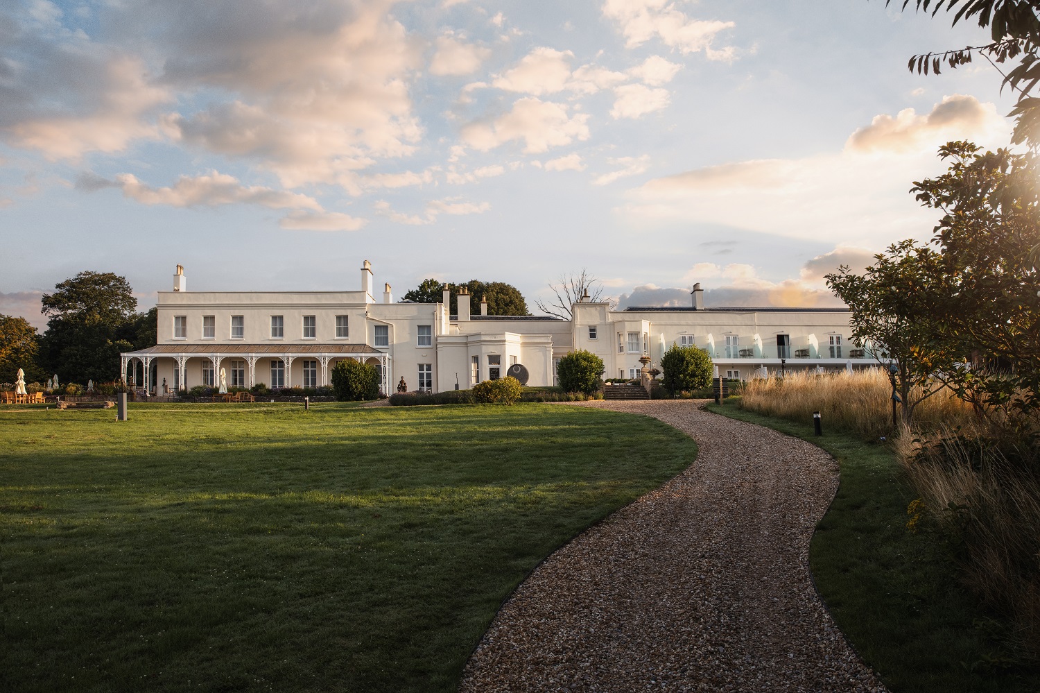 Photo of the Lympstone Manor Hotel on a sunny early evening.